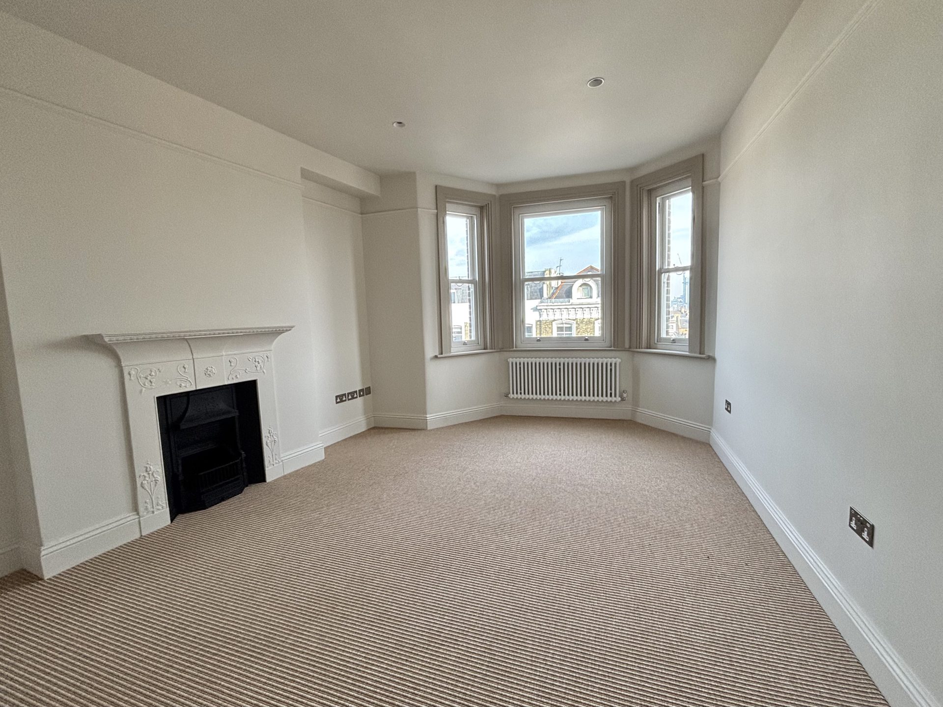 Harvard Mansions reception room before refurbishment